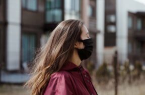 106815196-1608661915814-a-young-woman-on-a-walk-wearing-black-handmade-protective-mask-women-female-long-hair-covid-19_t20_ynryJ6