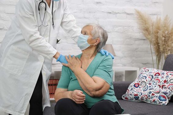 Medical worker use stethoscope to examine pulse rate on senior patient. Health care check up.