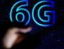 brazil-2021-01-25-in-this-photo-illustration-a-person-holds-a-mobile-phone-with-a-6g-logo-in-the-background