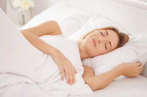 Woman-Sleeping-in-Bed