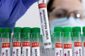 FILE PHOTO: Illustration shows test tubes labelled “Monkeypox virus positive