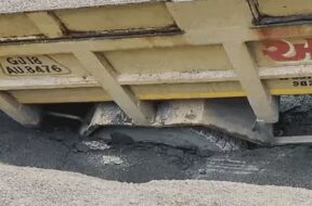 SURAT, road sat down