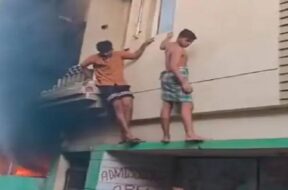 two young men jump from balcony as fire