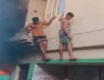 two young men jump from balcony as fire