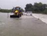 eco car, stuck in river