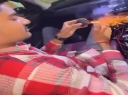 youth bursting fiercrackers in cars