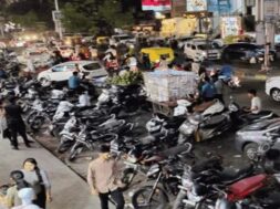 Vehicles parked on the sidewalk