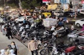 Vehicles parked on the sidewalk
