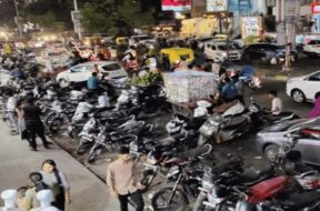 Vehicles parked on the sidewalk