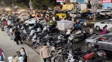 Vehicles parked on the sidewalk