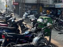 Vehicles parked on the sidewalk