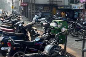 Vehicles parked on the sidewalk