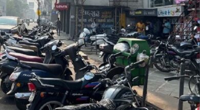 Vehicles parked on the sidewalk