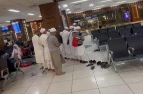 Ahmedabad airport. 8 people Namaj