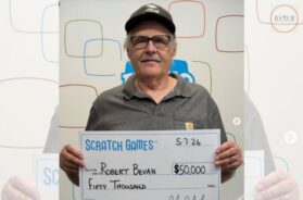 Who does this brother who won the lottery 18 times credit for his luck?
