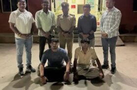 two arrested with weapons