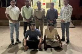 two arrested with weapons