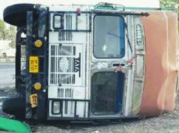 Storm, overturns truck