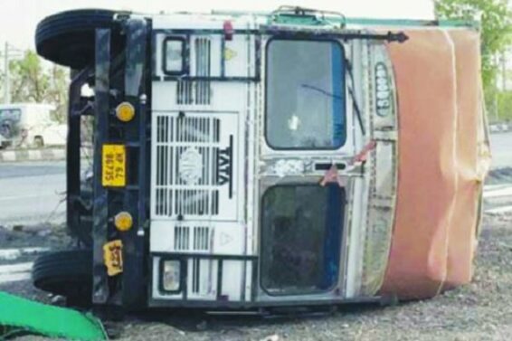 Storm, overturns truck
